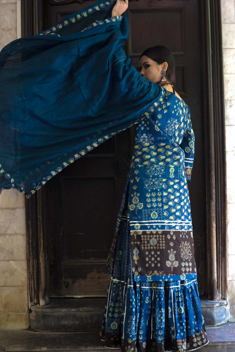 Hasali, a long blue kurta from the back