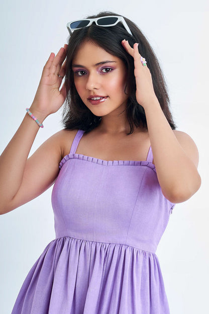 Person wearing a vibrant loungewear lavender dress
