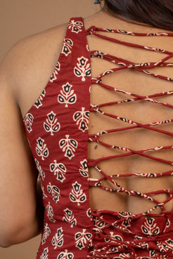 butta Red patterned top with open back design